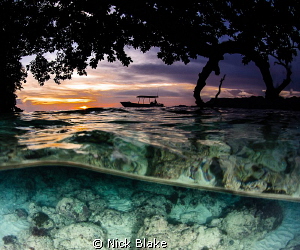 Sunset in Misool, Indonesia by Nick Blake 